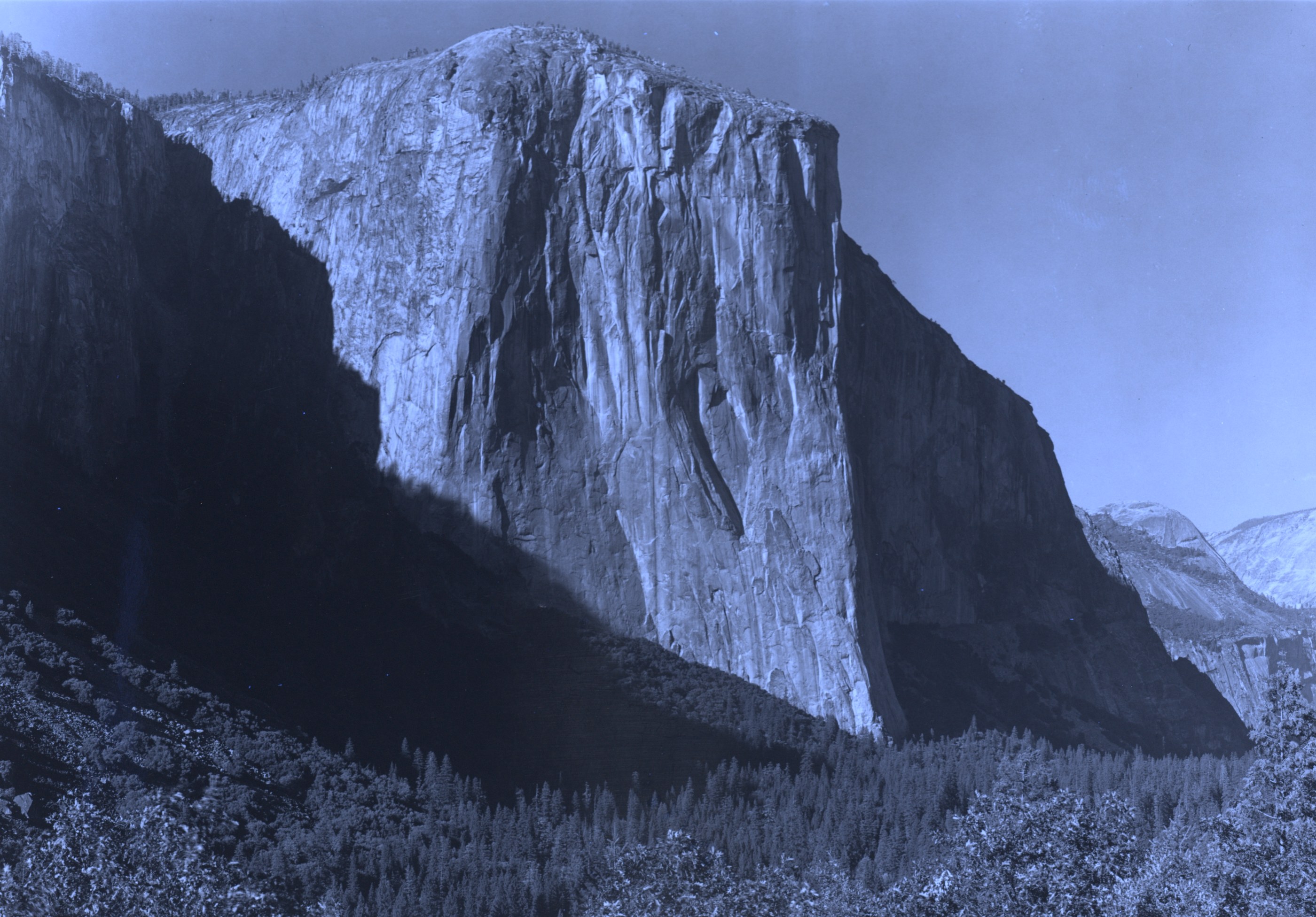 Ultraviolet-induced fluorescence — El Capitan from Inspiration Point
