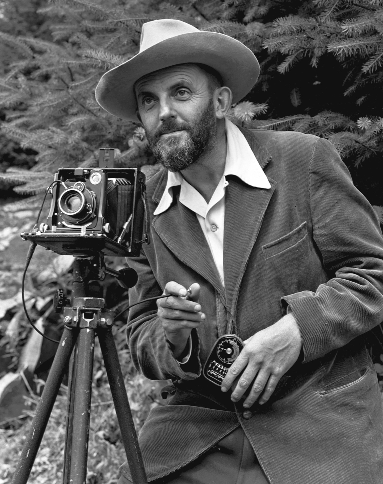 Ansel Adams with his camera, 1950 — photograph by J. Malcolm Greany