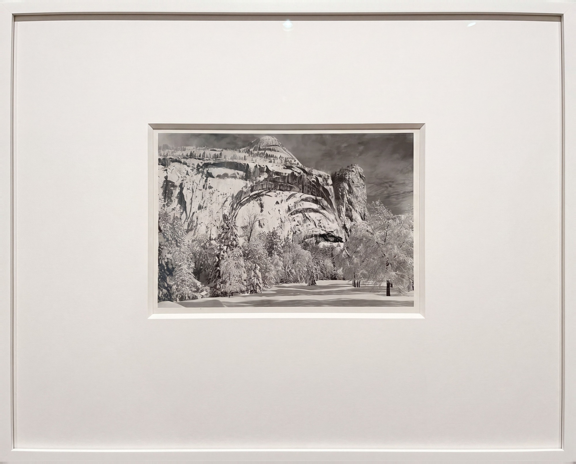 North Dome, Royal Arches, Washington Column, Winter — framed: a generated view of the matted print in a thin white frame